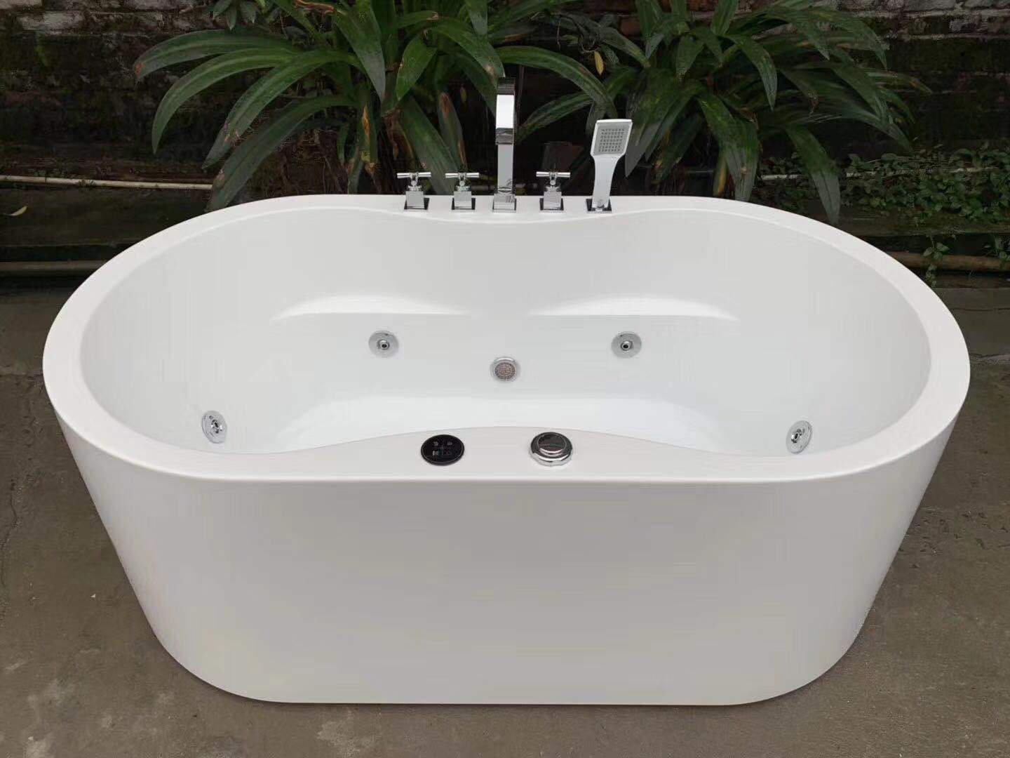 white color whirlpool massage tub with faucet